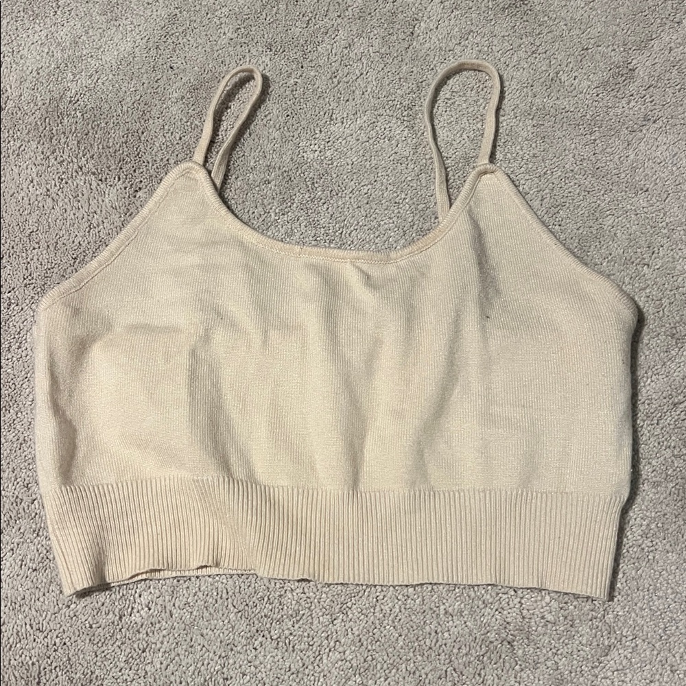 cream colored yozy sweater tank top